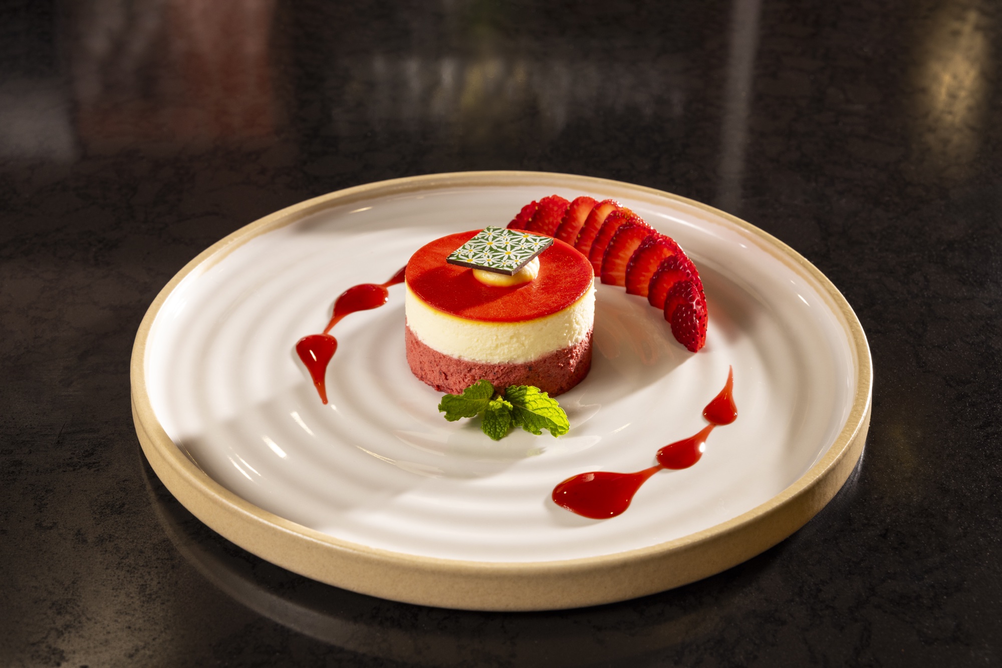 A strawberry and cream dessert with fresh strawberries