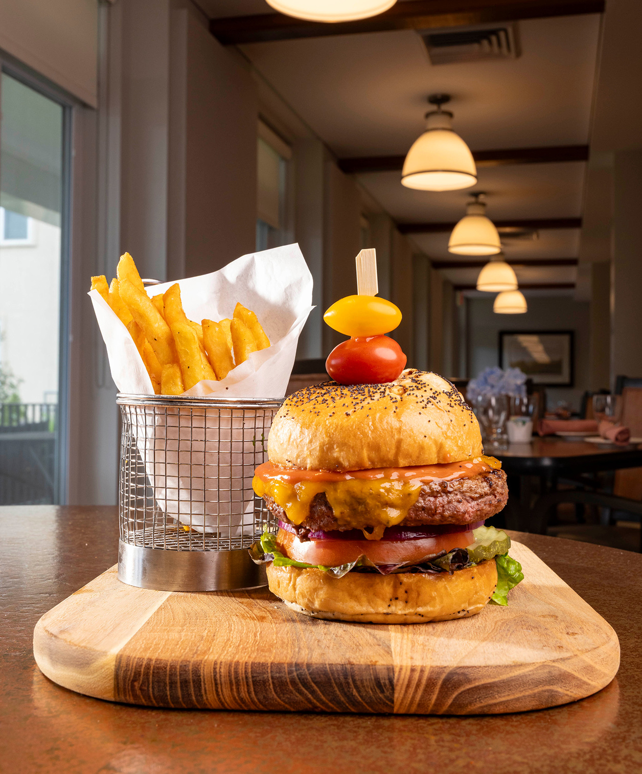 A burger and fries served at The Café